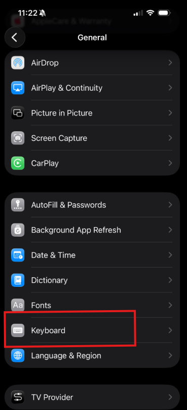 iPhone General settings menu showing Keyboard option highlighted in red